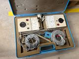 a box with wires and wires in it on the floor