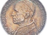 une vieille pièce de monnaie sur laquelle figure le portrait d'un homme