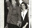 black and white photograph of a man and a woman standing next to each other