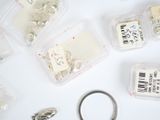 a lot of different types of sewing supplies on the table