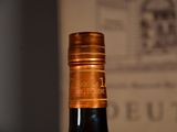a bottle of wine that is sitting on a table