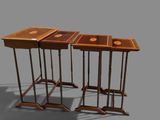 deux tables posées sur une surface grise, sur lesquelles se trouve un plateau