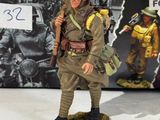 an image of a figurine of a soldier with a rifle in his hand