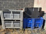 two crates sitting next to each other on the ground