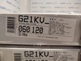 two boxes of electronic equipment sitting on top of each other