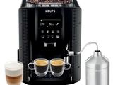 a close up of a coffee machine with two cups of coffee