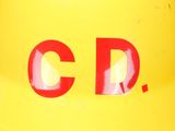 a close up of a yellow fire hydrant with red letters on it