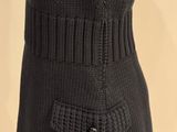 a close up of a black sweater on a mannequin mannequin mannequin mannequin mannequin mannequin mannequin manne