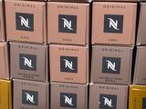 boxes stacked on top of each other on a shelf in a store