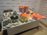 a table with a lot of tools on it in front of a wall