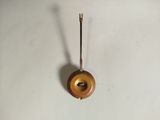 a clock that is on the wall with a pendulum on it