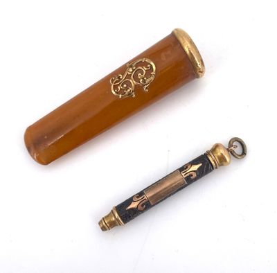 Fume-cigarettes en ambre et or jaune 750 °/°°° (18K). Longue…
