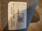 a label on the back of a bag that has a barcode on it