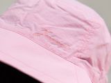 a close up of a pink hat on a mannequin head