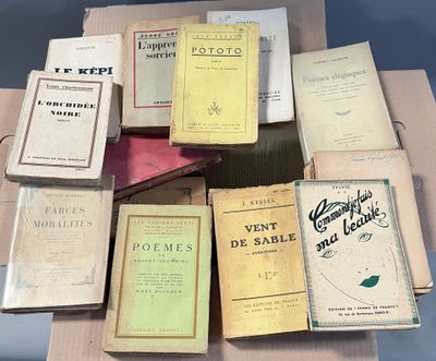 a lot of old books on a table together