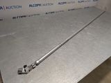 a close up of a metal object on a table in a room