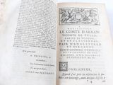 an open book with a picture of a man and a woman on it