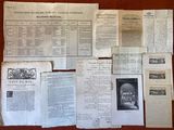 some old papers are laying on a table with a red table cloth