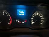a car dashboard with a digital display on it