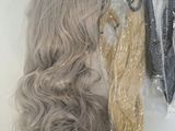 a wig and a pair of scissors on a table