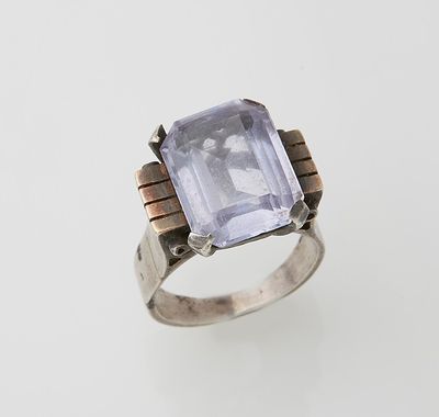 an image of a ring with an amethorate stone on it