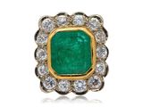 an emerald and diamond ring