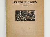 an old book with a black and white drawing on it