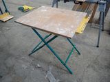 a table that is sitting in the middle of a room