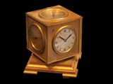a clock that is sitting on top of a wooden stand