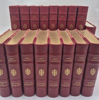 a stack of red books sitting on top of each other