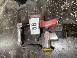 a close up of a tool on a metal surface