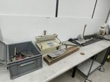many different types of machines sitting on a table