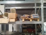 many boxes and boxes on a shelf in a warehouse