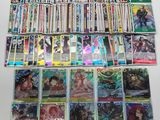 a large collection of card game cards sitting on top of a table