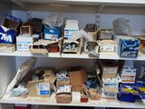 many boxes and boxes on the shelves in the closet