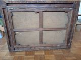 a picture of an old window frame in the middle of the floor