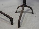 pair of antique cast iron table legs and a wooden table top