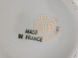 a close up of a plate with a logo on it