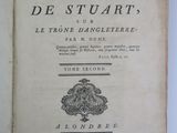 an open book with a picture of a lion on it