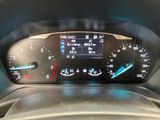 the dashboard of a car with a digital display on it
