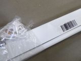a white box with a barcode on it sitting on a table