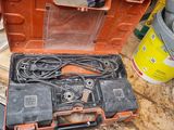 a tool box that is sitting on the ground next to other tools
