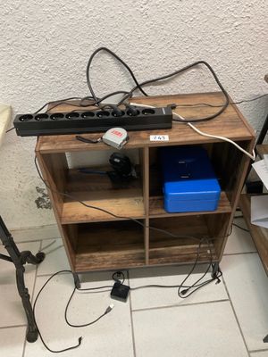 a desk with a keyboard and a monitor on top of it