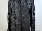 a black coat on a mannequin mannequin mannequin mannequin mannequin mannequin mannequin mannequin mannequin