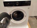 a washing machine that is sitting on a pallet