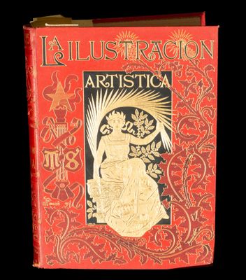 un vieux livre à la couverture rouge ornée de dorures