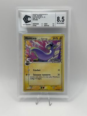 a close up of a pokemon card on a white background
