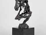 statue of a horse on a marble base on a white background