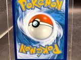a close up of a plastic box with a pokemon ball inside of it