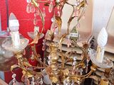 a chandelier that is sitting on a table in a room